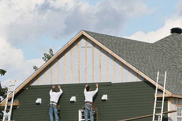 Professional Vinyl Siding technician working in Wingate, NC